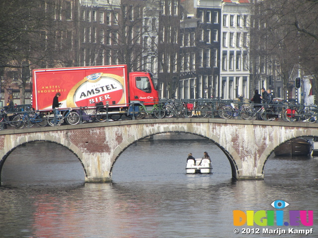 SX21589 Pedelo underneath bridge with Beer delivery lorry